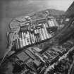 Oblique aerial view centred on the paper mill, taken from the N.