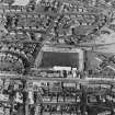 Oblique aerial view of Methil centred on East Fife football ground, taken from the SE.