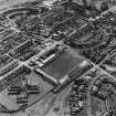 Oblique aerial view of Methil centred on East Fife football ground with Aberhill Primary School adjacent, taken from the N.