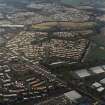 Oblique aerial view centred on Woodside housing estate in Glenrothes, taken from the SW.