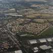 Oblique aerial view centred on Woodside housing estate in Glenrothes, taken from the SSW.