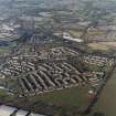 Oblique aerial view centred on Woodside housing estate in Glenrothes, taken from the SE.