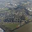 Oblique aerial view centred on Woodside housing estate in Glenrothes, taken from the SE.