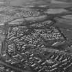 Oblique aerial view centred on Woodside housing estate in Glenrothes, taken from the WSW.