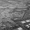 Oblique aerial view centred on Woodside housing estate in Glenrothes, taken from the SW.