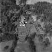 Oblique aerial view of Charleton House centred on a country house, taken from the SE.