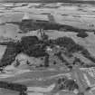 Distant oblique aerial view of Charleton House centred on a country house, taken from the SE.