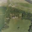 Oblique aerial view of Earlshall country house, formal garden and dovecot, taken from the W.