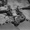 Oblique aerial view centred on the country house, taken from the N.