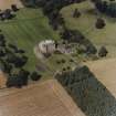 Oblique aerial view centred on the country house, garden, pavilions and lodges, taken from the S.