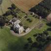 Oblique aerial view centred on the country house, garden, pavilions and lodges, taken from the W.