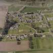 Oblique aerial view centred on the hospital, taken from the SE.