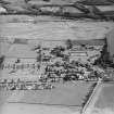 Oblique aerial view centred on the hospital, taken from the NNW.