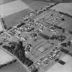 Oblique aerial view centred on the hospital, taken from the S.