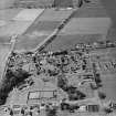 Oblique aerial view centred on the hospital, taken from the SE.
