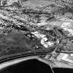 General oblique aerial view showing the position of the burial ground close to the sea.