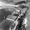 Oblique aerial view from South-East.