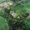 Oblique aerial view centred on Fyvie Castle with walled garden adjacent, taken from the WNW.