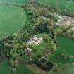 Oblique aerial view centred on Fyvie Castle with walled garden adjacent, taken from the WSW.
