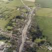 Oblique aerial view centred on the village, taken from the NNE.