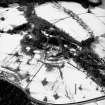 Oblique aerial photograph, taken from the E, centred on Kildrummy Castle.