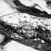 Oblique aerial photograph, taken from the NW, centred on Kildrummy Castle.