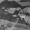 Oblique aerial view of Leith Hall centred on the country house, walled garden and offices, taken from the S.