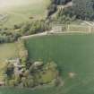 Oblique aerial view of the manse with the church adjacent, taken from the ESE