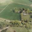 Oblique aerial view of the church with the manse adjacent, taken from the WNW