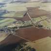 Oblique aerial view centred on the village, taken from the S.