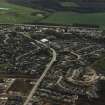 Oblique aerial view centred on the village, taken from the N.