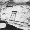 Oblique aerial view under snow, from ESE.
