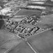 Oblique aerial view of Udny Green village taken from the SW.