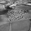 Oblique aerial view of Udny Green village taken from the SSW.