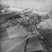 Oblique aerial view of the village taken from the SSW.