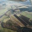 General oblique aerial view centred on Monymusk village, taken from the NW.