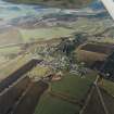 General oblique aerial view centred on Monymusk village, taken from the SW.