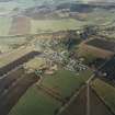 General oblique aerial view centred on Monymusk village, taken from the SSW.