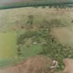 Oblique aerial view centred on the ruins of the Country House, taken from the S.