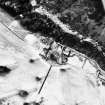 Aerial view of Mar Lodge and surrounding buildings in the snow.