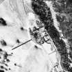 Aerial view of Mar Lodge and surrounding buildings in the snow.