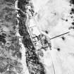 Aerial view of Mar Lodge and surrounding buildings in the snow.