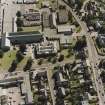 Oblique aerial view centred on the college, taken from the NNW.