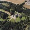 Oblique aerial view centred on the country house, taken from the ESE.