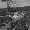 Oblique aerial view centred on the country house, taken from the SE.