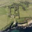 Aerial view of Dunbeath Castle and grounds from SE.