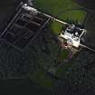 Oblique aerial view centred on the castle and walled garden, taken from the SSE.