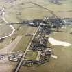 Oblique aerial view centred on the village, taken from the NE.