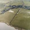 Oblique aerial view centred on the village, taken from the N.