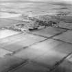 General oblique aerial view centred on the village, taken from the W.